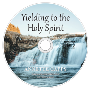 CD cover with waterfall and text 'Yielding to the Holy Spirit' by Annette Capps Cappsministries.com