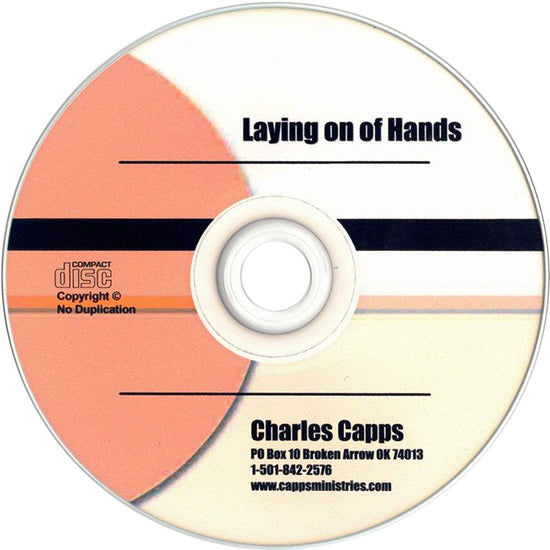 CD with 'Laying on of Hands' by Charles Capps on a white background
