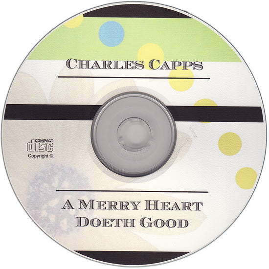 CD with 'Charles Capps' and 'A Merry Heart Doeth Good' text on a white background cappsministries.com