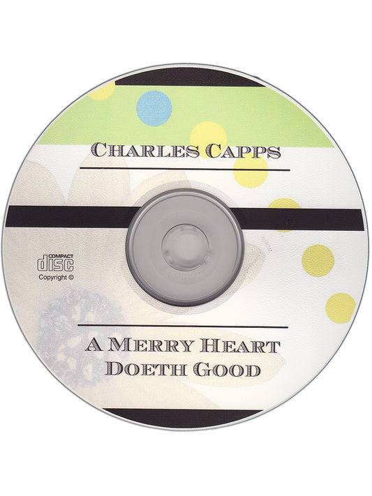 CD with 'Charles Capps' and 'A Merry Heart Doeth Good' text on a white background cappsministries.com