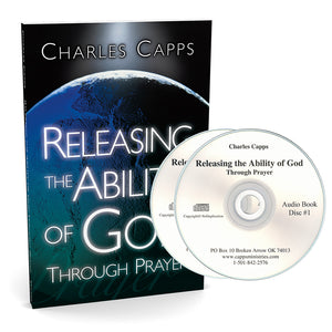 Book and audio disc set titled 'Releasing the Ability of God Through Prayer' by Charles Capps on a white background.