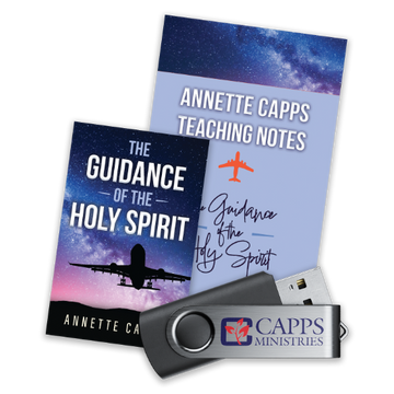 Two books titled 'The Guidance of the Holy Spirit' and 'Annette Capps Teaching Notes' with a USB drive featuring Capps Ministries logo. cappsministries.com
