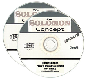 Two 'The Solomon Concept' compact discs with a white background