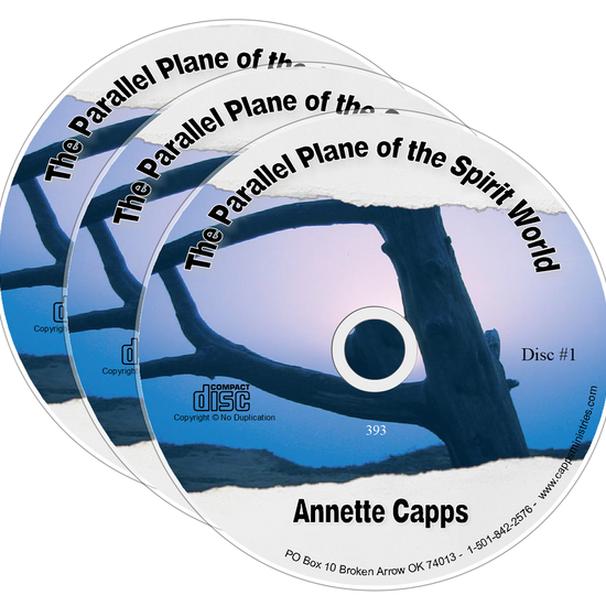 Three stacked CDs of the series by Annette Capps titled, The Parallel Plane of the Spirit World. www.cappsministries.com