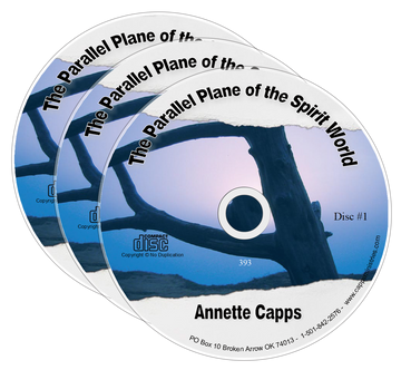 Three stacked CDs of the series by Annette Capps titled, The Parallel Plane of the Spirit World. www.cappsministries.com