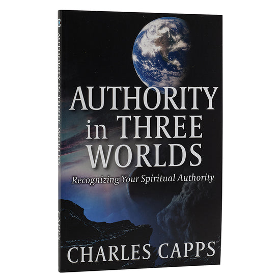 Book cover of 'Authority in Three Worlds' by Charles Capps with Earth image on black background cappsministrie.com