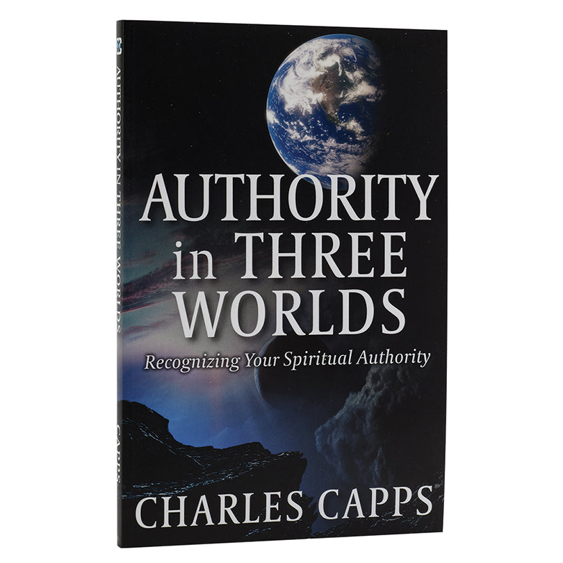 Book cover of 'Authority in Three Worlds' by Charles Capps with Earth image on black background cappsministrie.com