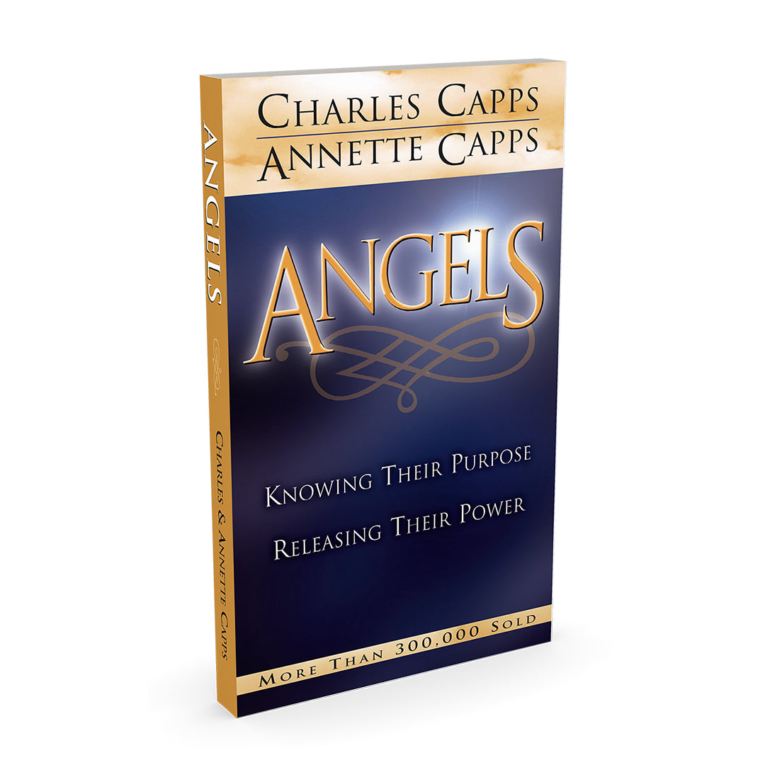 Book titled 'Angels: Knowing Their Purpose, Releasing Their Power' by Charles and Annette Capps on a white background