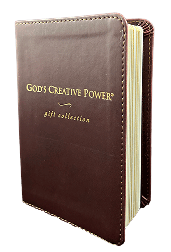 A brown leather-bound book titled 'God's Creative Power gift collection' with gold lettering, shown on a plain white background.