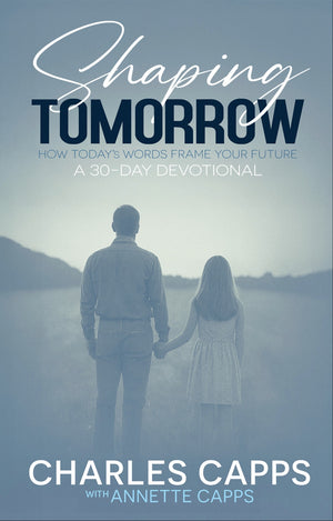 Book cover of 'Shaping Tomorrow' by Charles Capps with a blurred image of a man and daughter holding hands. cappsministries.com