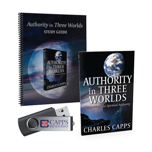 Two copies of 'Authority in Three Worlds' by Charles Capps, a USB drive, and a study guide on a white background.