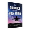 Book cover of 'The Guidance of the Holy Spirit' by Annette Capps with a silhouette of an airplane against a starry sky.