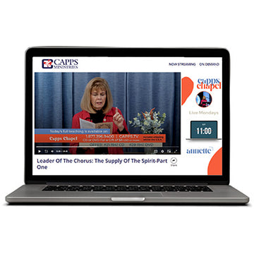 Laptop displaying a CAPPS Ministries video on a white background